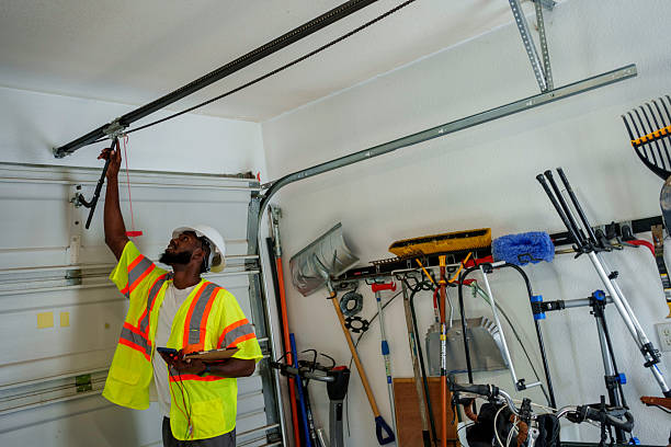 Professional Garage Door Panel Replacement technician working in Harlan, IN